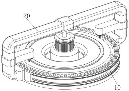 一种转动式驱动冷却液循环的法兰盘加工用固定台的制作方法